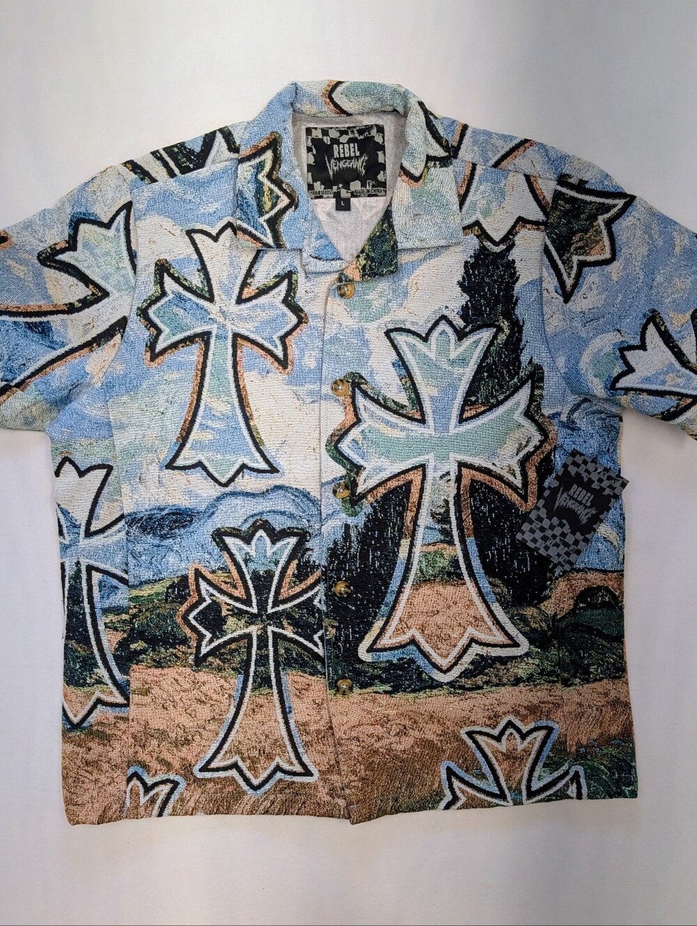 Rebel Vengeance tapestry shirt features a Gothic baroque-style graphic cross pri